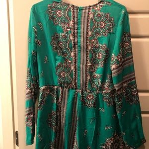 Silk elegant cute romper. Never wore it size L